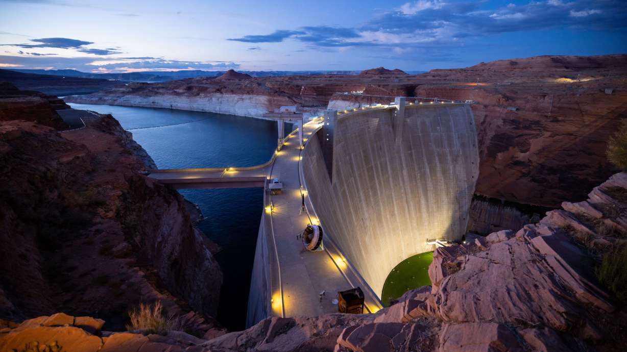 Glen Canyon Dam holds back Lake Powell in Page, Ariz., on July 18, 2022. Upper Basin was at a staggering 4 million-acre feet loss, with power generation compromised, but a wet winter helped.