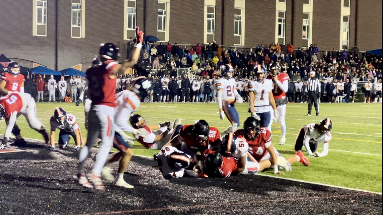 West celebrates the game-winning touchdown against Brighton to clinch the Region 6 title on Wednesday.
