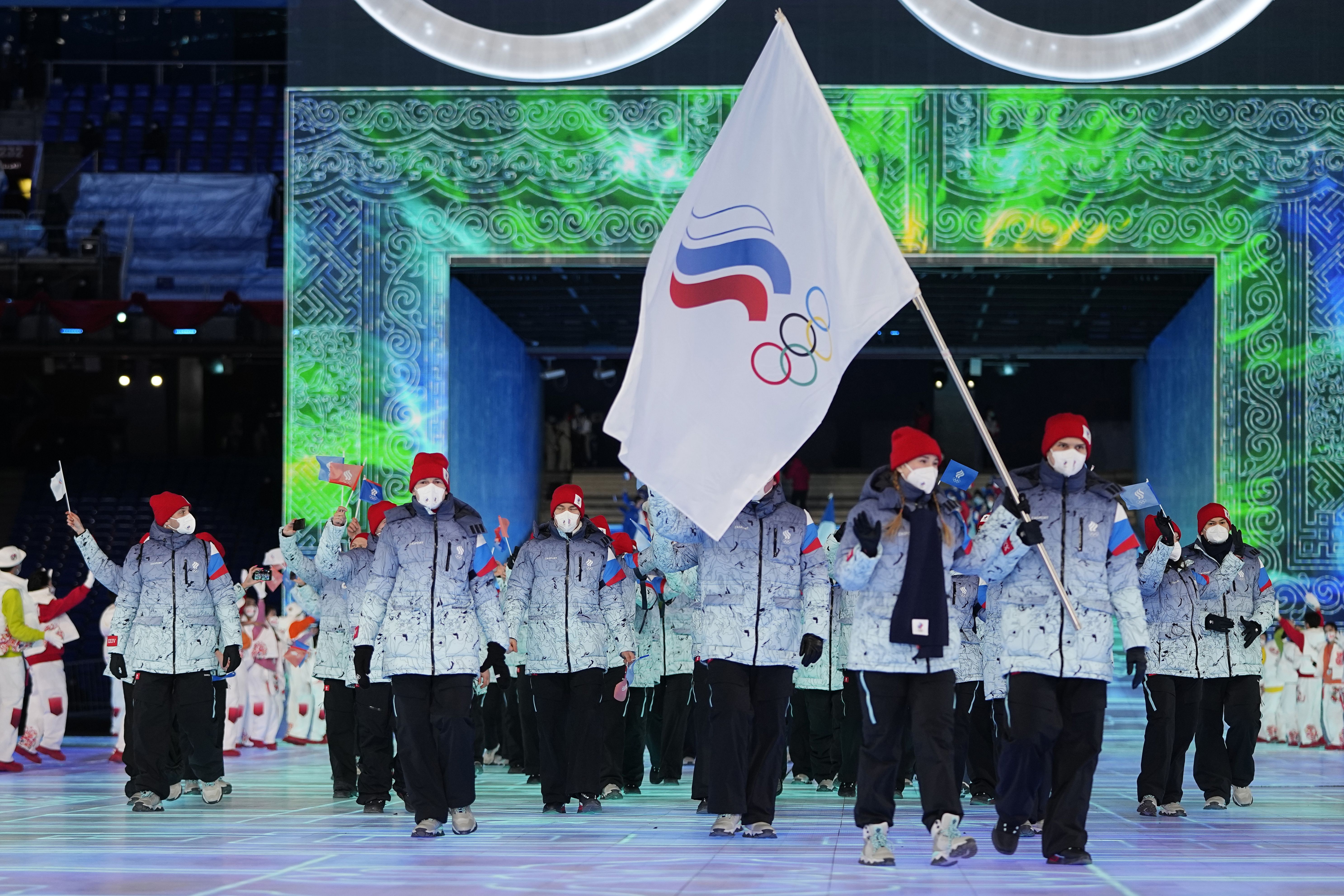 Athletes competing under the banner of the Russian Olympic Committee participate in the opening ceremony of the 2022 Winter Olympics, on Feb. 4, 2022, in Beijing. The IOC suspended the Russian Olympic Committee on Thursday.