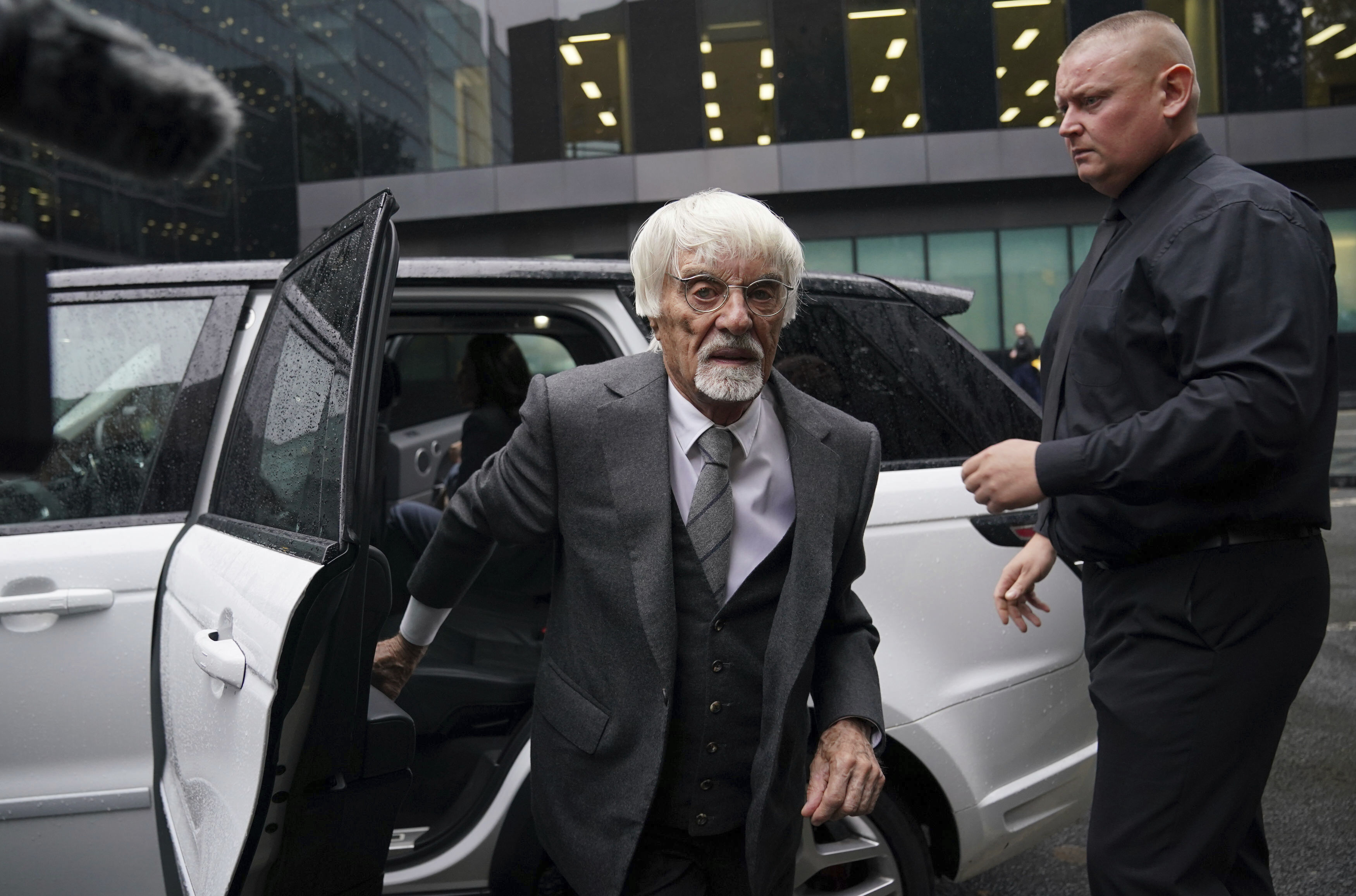 Former Formula One boss Bernie Ecclestone, left, arrives at Southwark Crown Court in London, on Thursday Oct.12, 2023. 