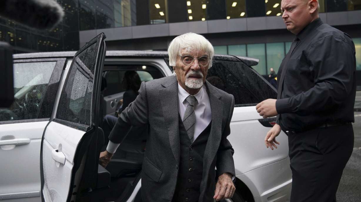 Former Formula One boss Bernie Ecclestone, left, arrives at Southwark Crown Court in London, on Thursday Oct.12, 2023.