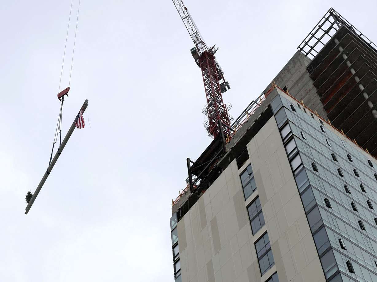 The final beam is raised at Astra Tower in Salt Lake City on Thursday. When finished, the 40-story Astra Tower in the downtown area will be Utah’s tallest high-rise at 450 feet.