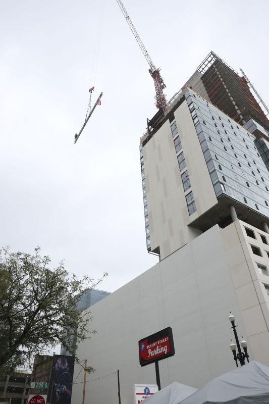 The final beam is raised at Astra Tower in Salt Lake City on Thursday. When completed, the 40-story Astra Tower in Salt Lake City's downtown will be Utah’s tallest high-rise at 450 feet. - Laura Seitz, Deseret News