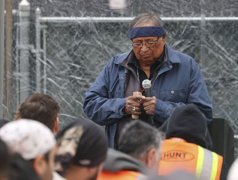 Jonah Yellowman gives a blessing during a beam placement ceremony at Astra Tower in Salt Lake City on Thursday. When finished, the 40-story Astra Tower in Salt Lake City's downtown will be Utah’s tallest high-rise at 450 feet. - Laura Seitz, Deseret News