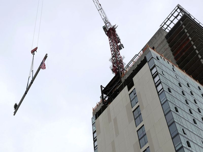 The final beam is raised at Astra Tower in Salt Lake City on Thursday. When finished, the 40-story Astra Tower in Salt Lake City's downtown will be Utah’s tallest high-rise at 450 feet. - Laura Seitz, Deseret News