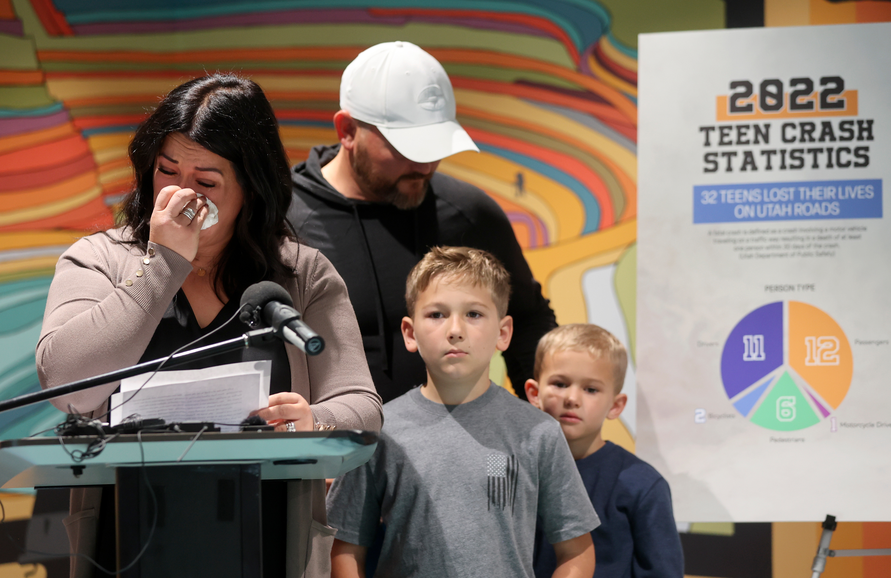 Holly Warren talks about losing her daughter Lilly Warren as a result of an accident at the Kearns Library on Thursday. Warren’s husband Sam Warren and sons Atticus and Johnny Warren stand by.