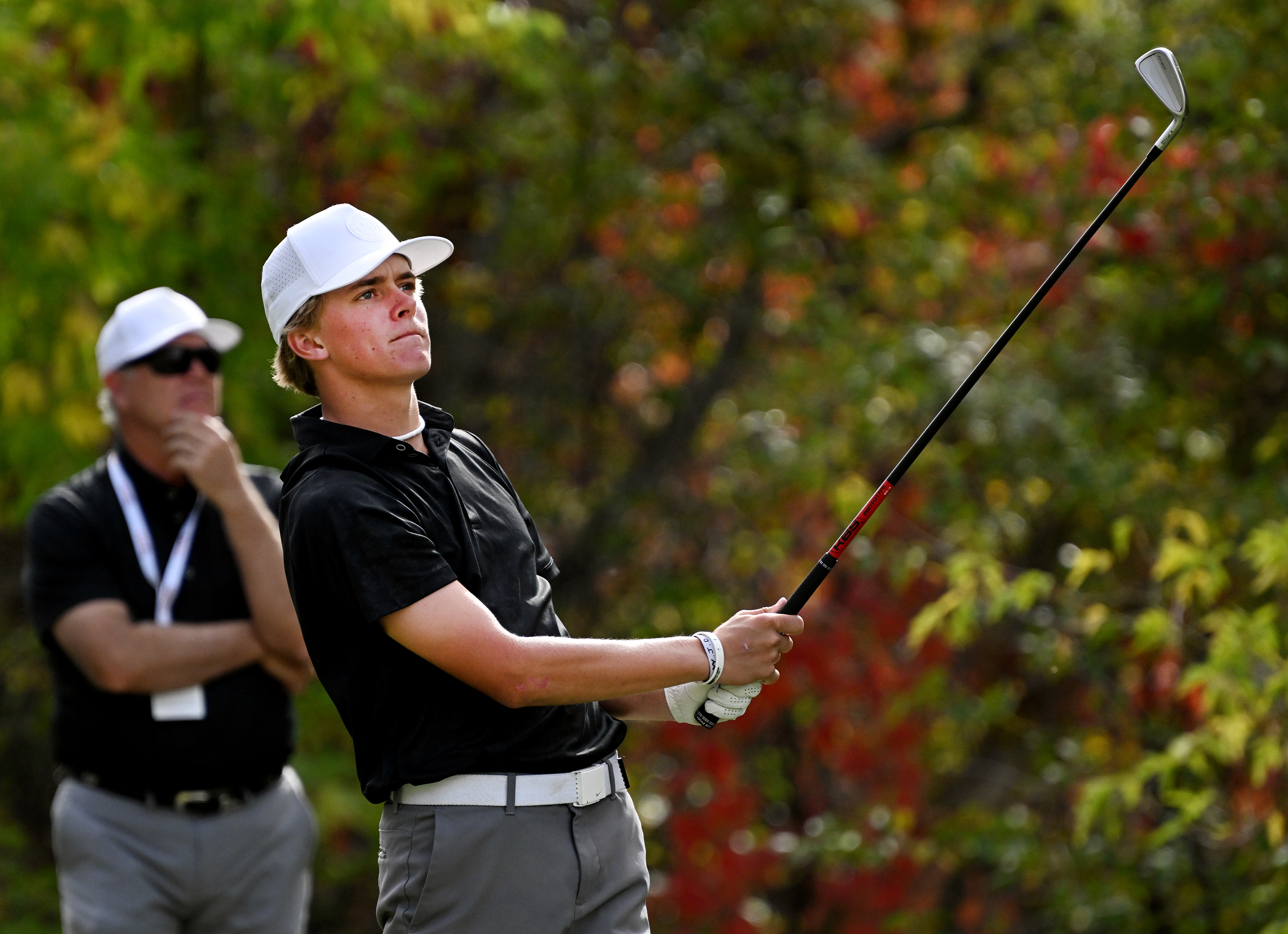 Corner Canyon’s Bowen Mauss watches his ball as it sails through the air as he plays in the 6A golf championships at Old Mill Golf Course in Holladay on Tuesday, Oct. 10, 2023. Mauss won the individual championship, shooting 135.