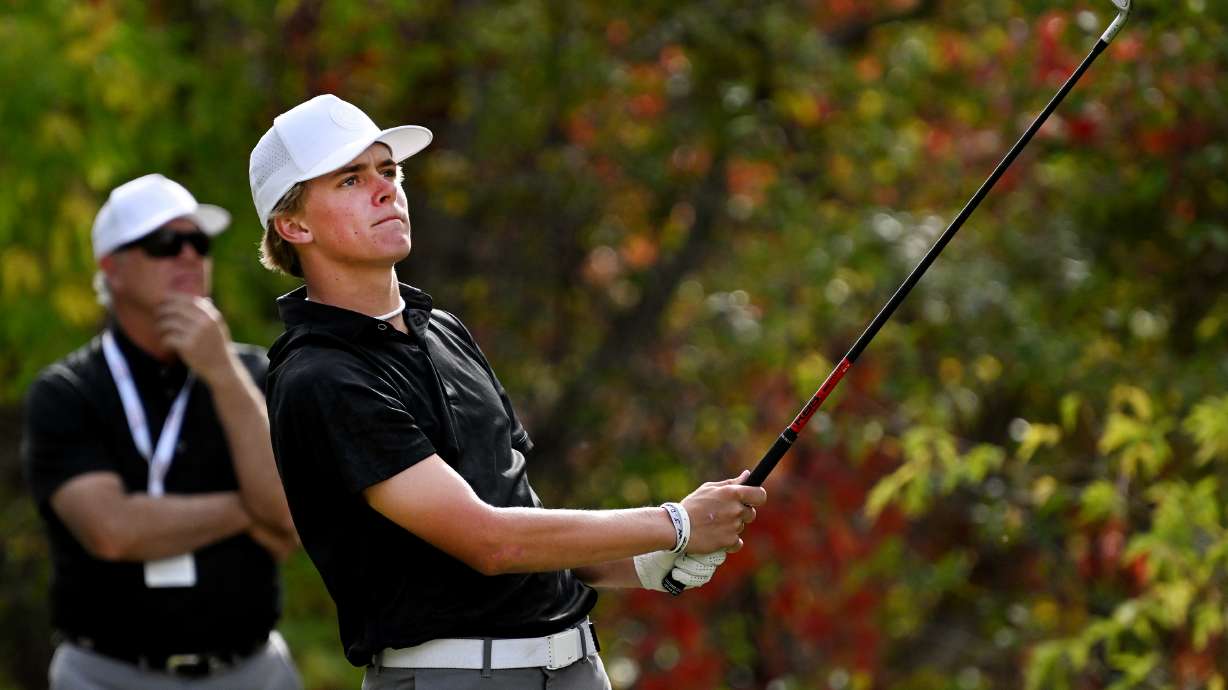 Corner Canyon’s Bowen Mauss watches his ball as it sails through the air as he plays in the 6A golf championships at Old Mill Golf Course in Holladay on Tuesday, Oct. 10, 2023. Mauss won the individual championship, shooting 135.