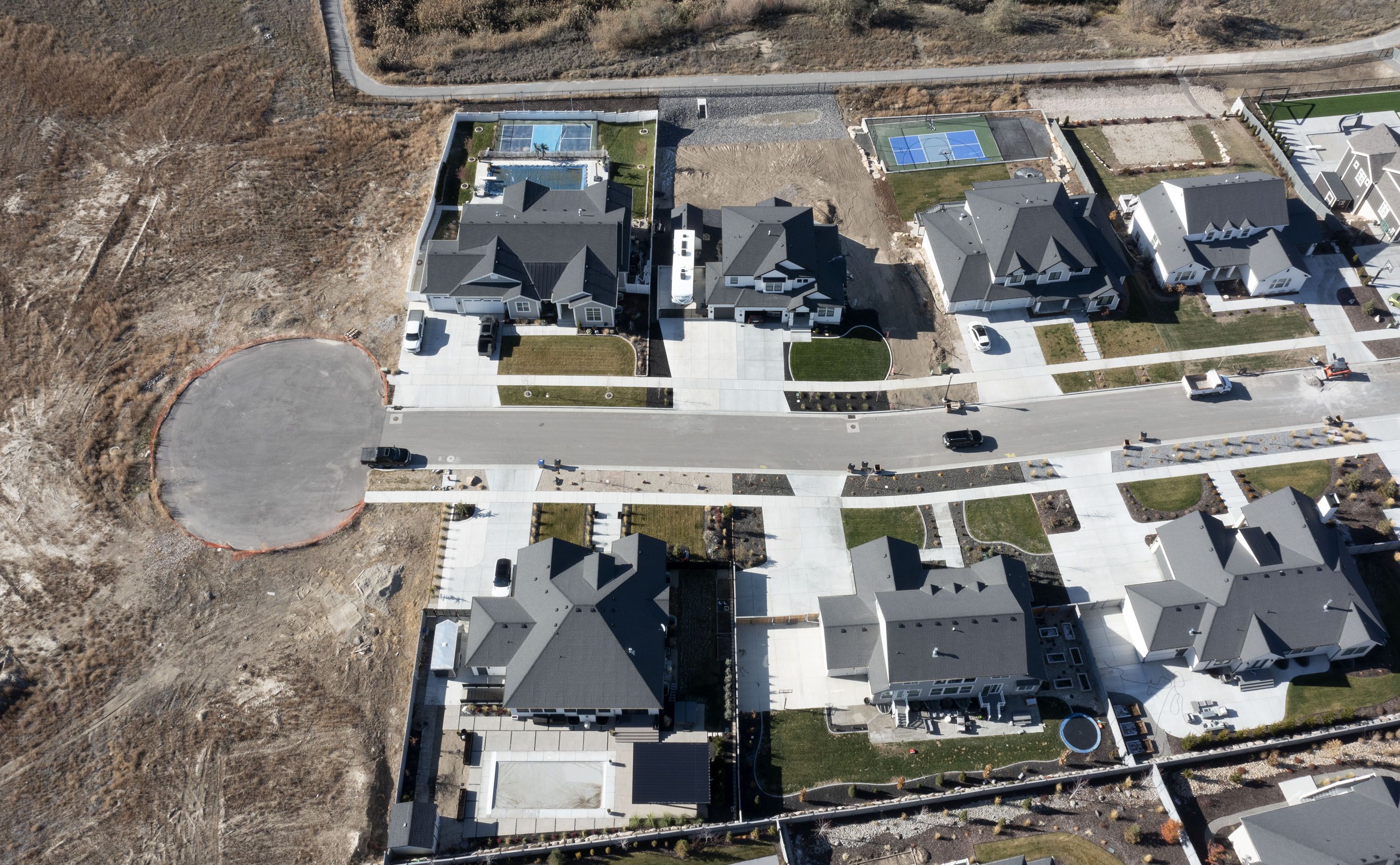 Homes in Big Willow Creek Estates are under construction in Draper, Nov. 11, 2022. Housing shortage sharpens in suburbs, small towns, report says.