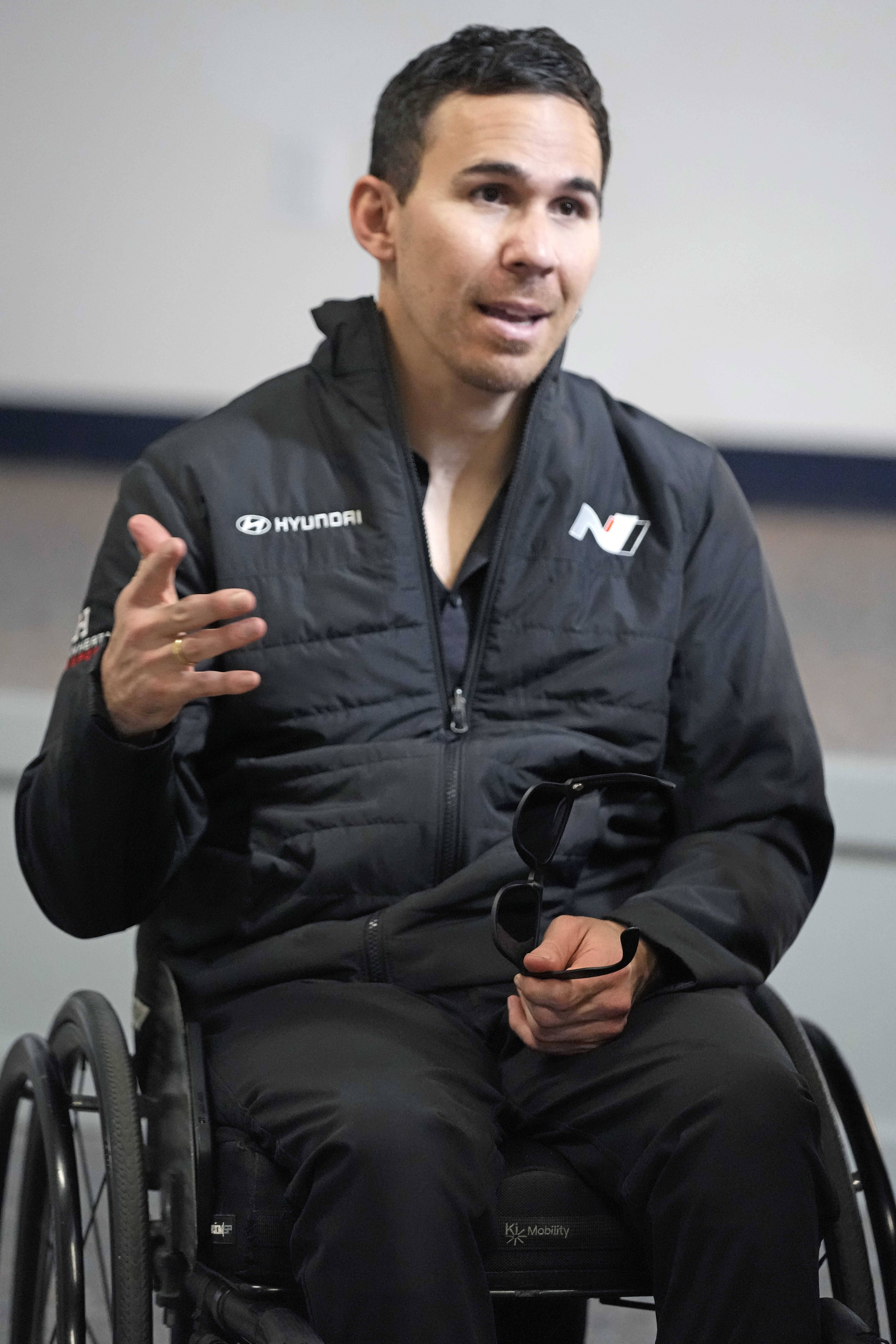 FILE - Paralyzed former IndyCar driver Robert Wickens answers questions during an interview prior to the Rolex 24 hour auto race at Daytona International Speedway, Thursday, Jan. 26, 2023, in Daytona Beach, Fla. Wickens is the championship leader headed into Friday's Michelin Pilot Challenge season finale at Road Atlanta in Braselton, Georgia. 