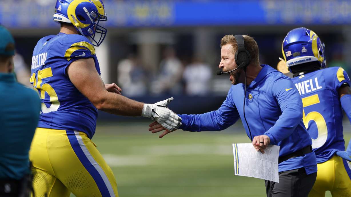 Los Angeles Rams head coach Sean McVay, center, celebrates with guard Coleman Shelton after the Rams scored during the first half of an NFL football game against the Philadelphia Eagles Sunday, Oct. 8, 2023, in Inglewood, Calif.