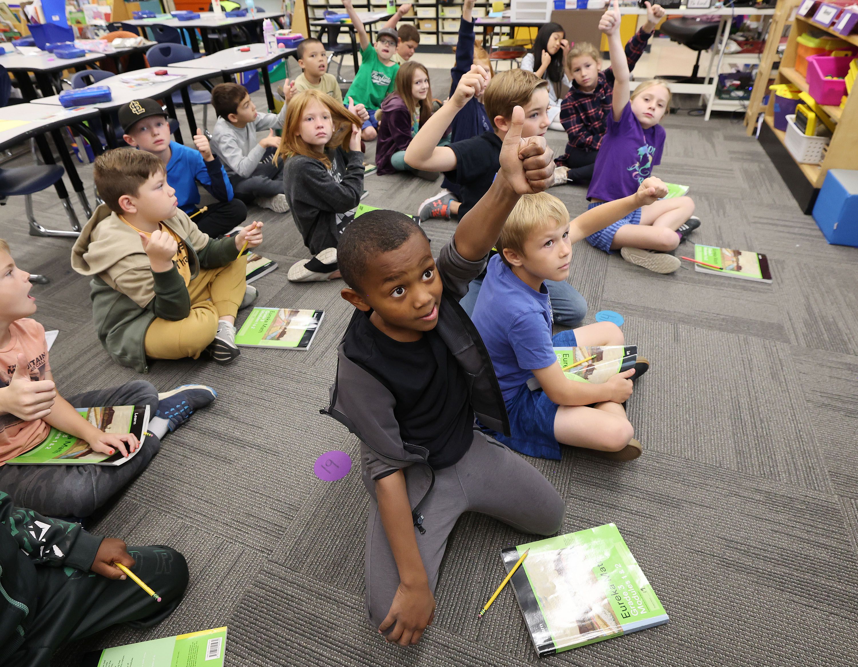 Wasatch Elementary School third grader Mounir Johnson gives a thumbs-up in class in Salt Lake City on Tuesday. The school was designated a Blue Ribbon School by the U.S. Department of Education.