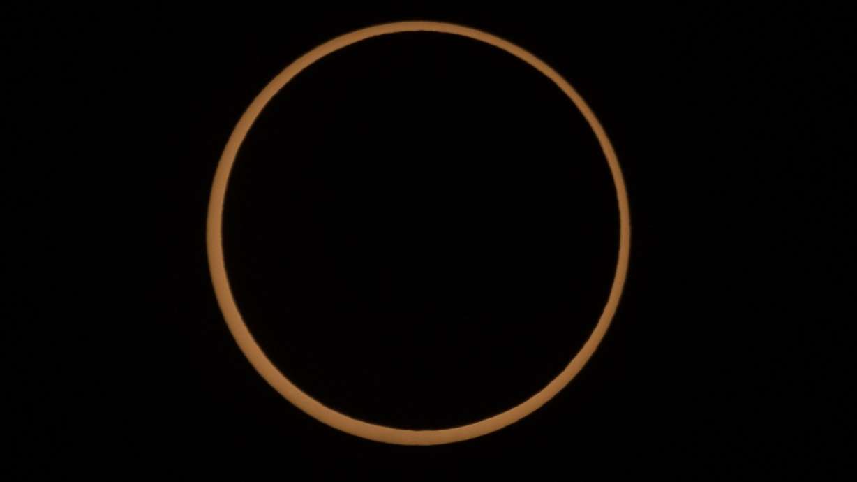 An annular solar eclipse is pictured in Torrey, Wayne County, on Oct. 14, 2023. A phenomenon known as the "ring of fire" is visible because of the way the sun's edges surround the moon perfectly.