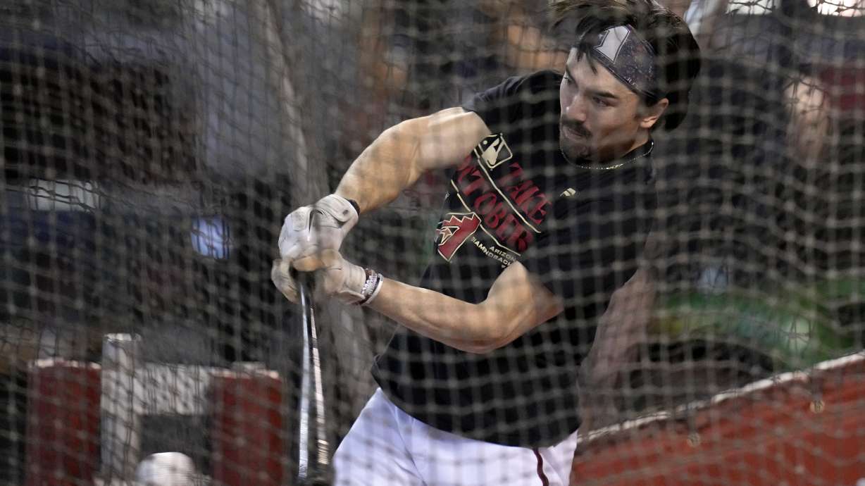 Arizona Diamondbacks' Corbin Carroll takes a swing during batting practice Friday, Oct. 13, 2023, at Chase Field in Phoenix as the team prepares to play against the Philadelphia Phillies in the baseball NL Championship Series starting Monday.