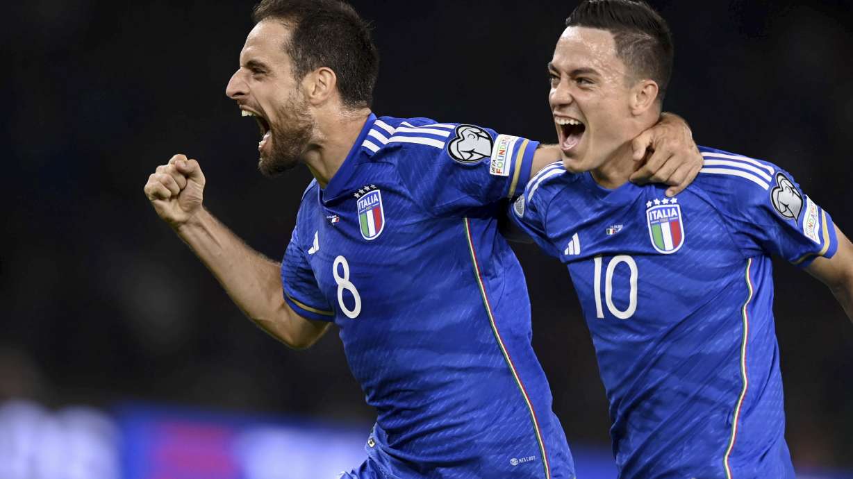 Italy's Giacomo Bonaventura, left, celebrates after scoring the opening goal during the Euro 2024 group C qualifying soccer match between Italy and Malta in Bari, Italy, Saturday, Oct. 14, 2023.