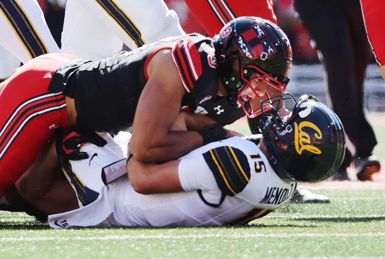 Utah Utes defensive end Jonah Elliss (83) sacks California Golden Bears quarterback Fernando Mendoza (15) in Salt Lake City on Saturday, Oct. 14, 2023.