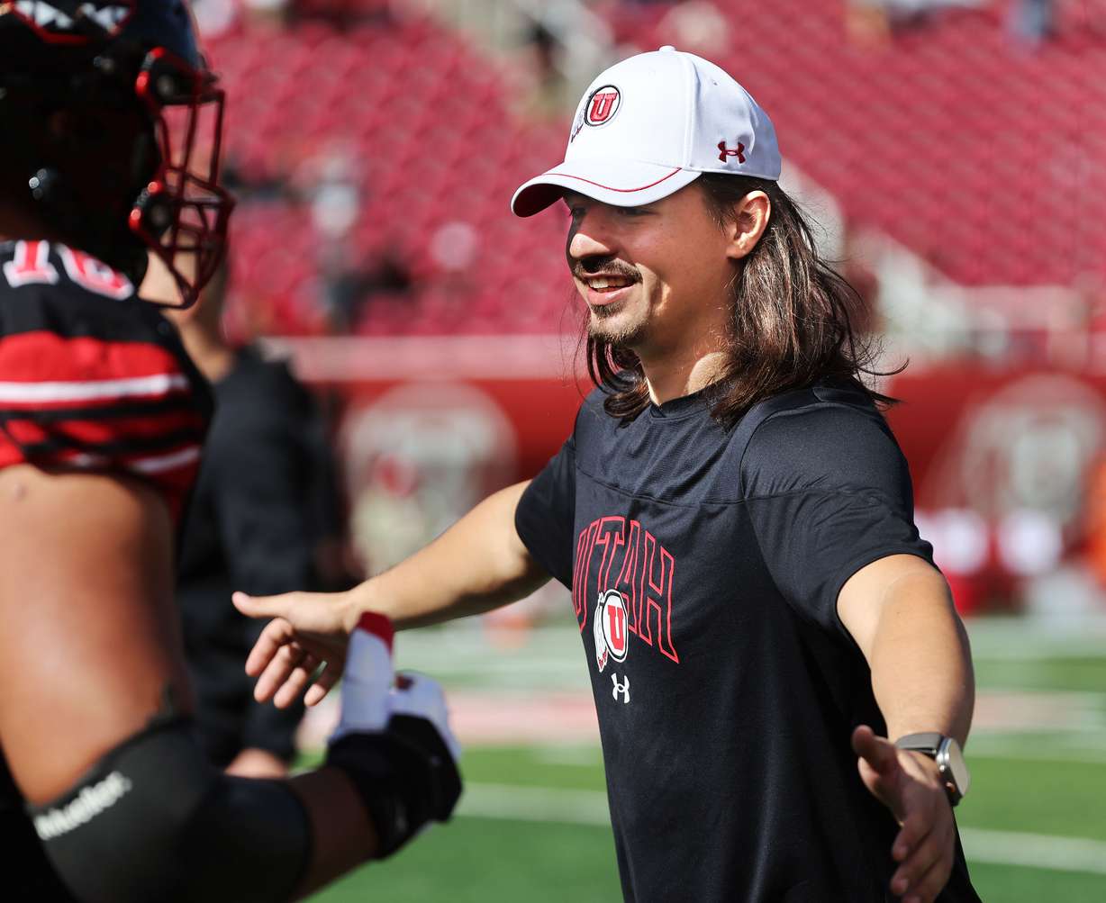 Utah Utes quarterback Cameron Rising (7) cheers on teammates during warm ups for Cal in Salt Lake City on Saturday, Oct. 14, 2023.