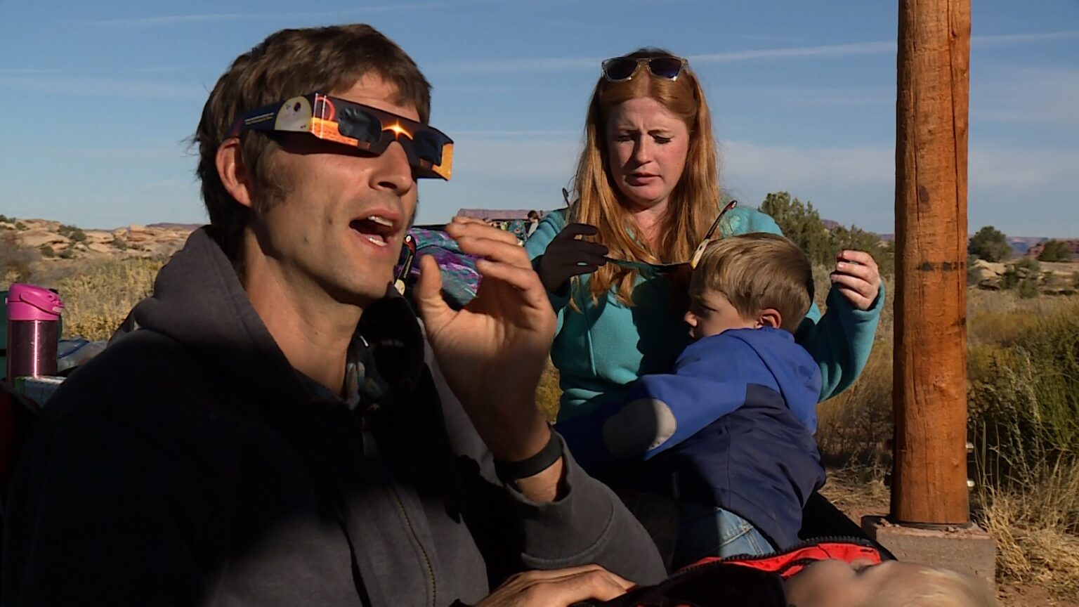 The Hopkins family gets ready to view the eclipse Saturday at Canyonlands National Park.