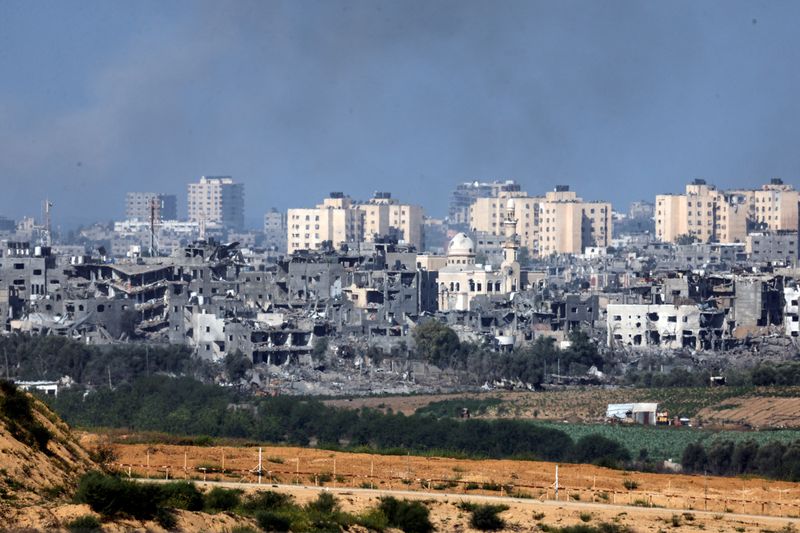 A view shows destroyed buildings in the Gaza Strip as seen from Israel's border with the Gaza Strip, in southern Israel on Sunday.