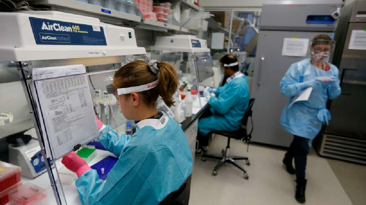 Microbiologists and lab technicians work at a lab at Utah Public Health Laboratory in Taylorsville on Nov. 13, 2020. Several pandemic-era benefits have recently expired, leaving millions without the economic assistance they’ve come to rely on.