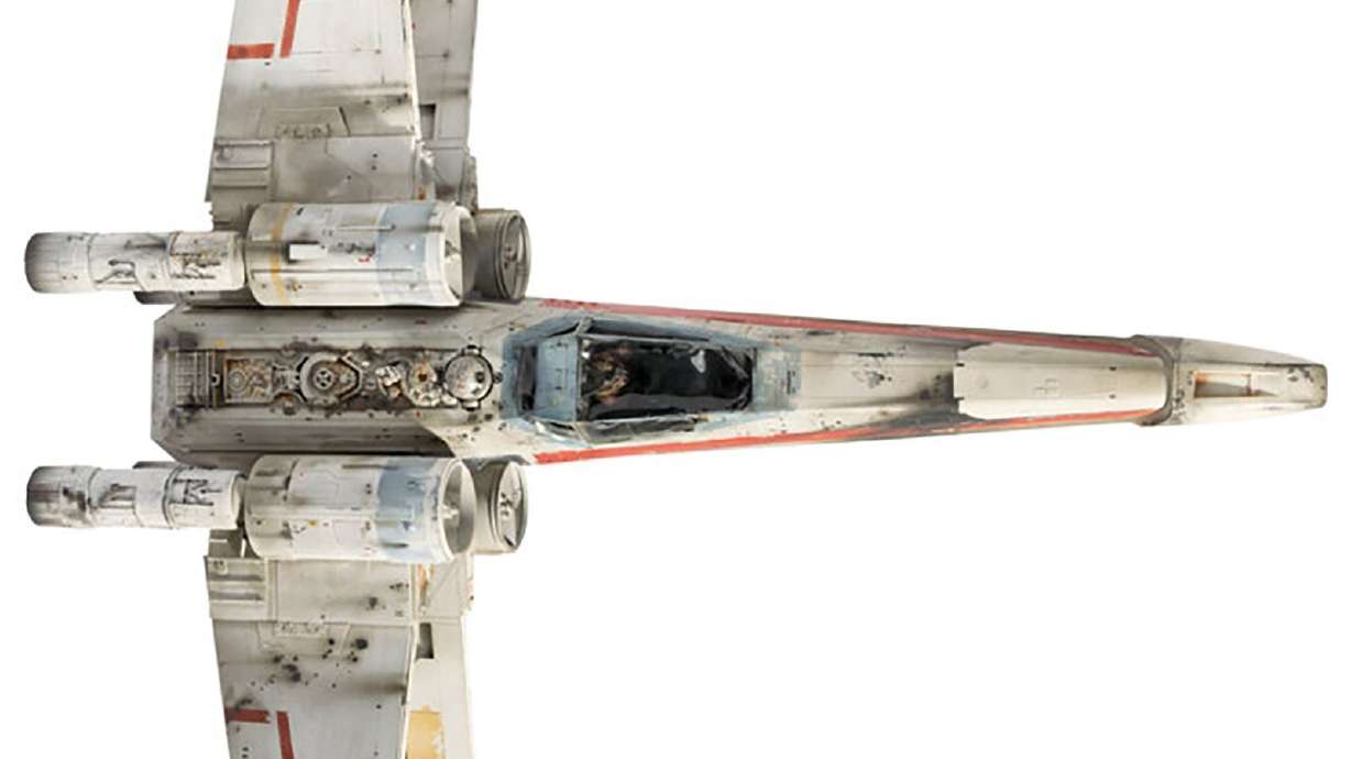 This model of an X-wing fighter used in the original 1977 "Star Wars" movie sold for over $3.13 million on Sunday.