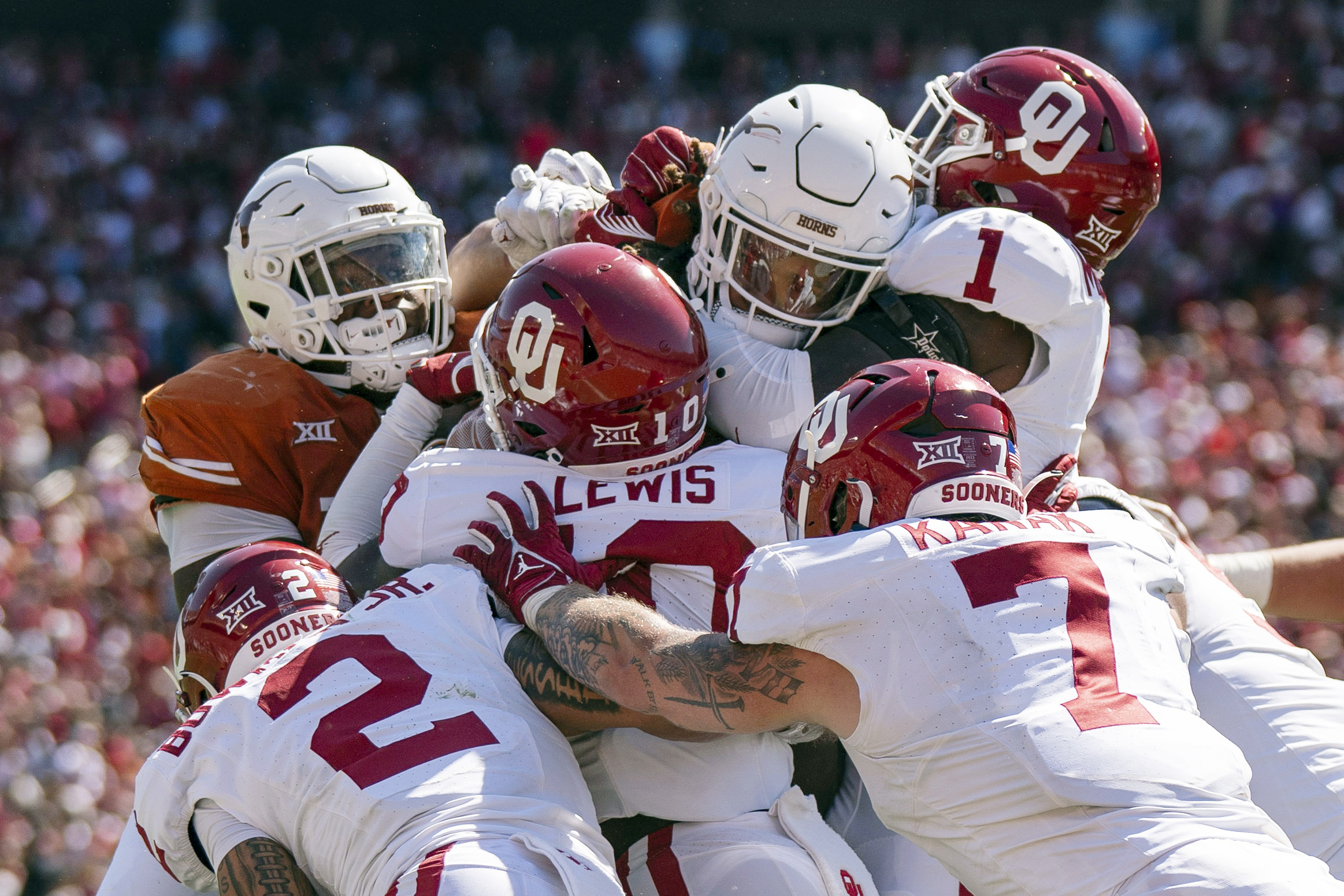 The Oklahoma defense stands up Texas running back Jonathon Brooks on a key goal line stand during the second half of an NCAA college football game at the Cotton Bowl, Saturday, Oct. 7, 2023, in Dallas. Oklahoma won 34-30. 