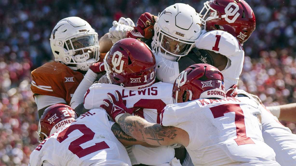 The Oklahoma defense stands up Texas running back Jonathon Brooks on a key goal line stand during the second half of an NCAA college football game at the Cotton Bowl, Saturday, Oct. 7, 2023, in Dallas. Oklahoma won 34-30.