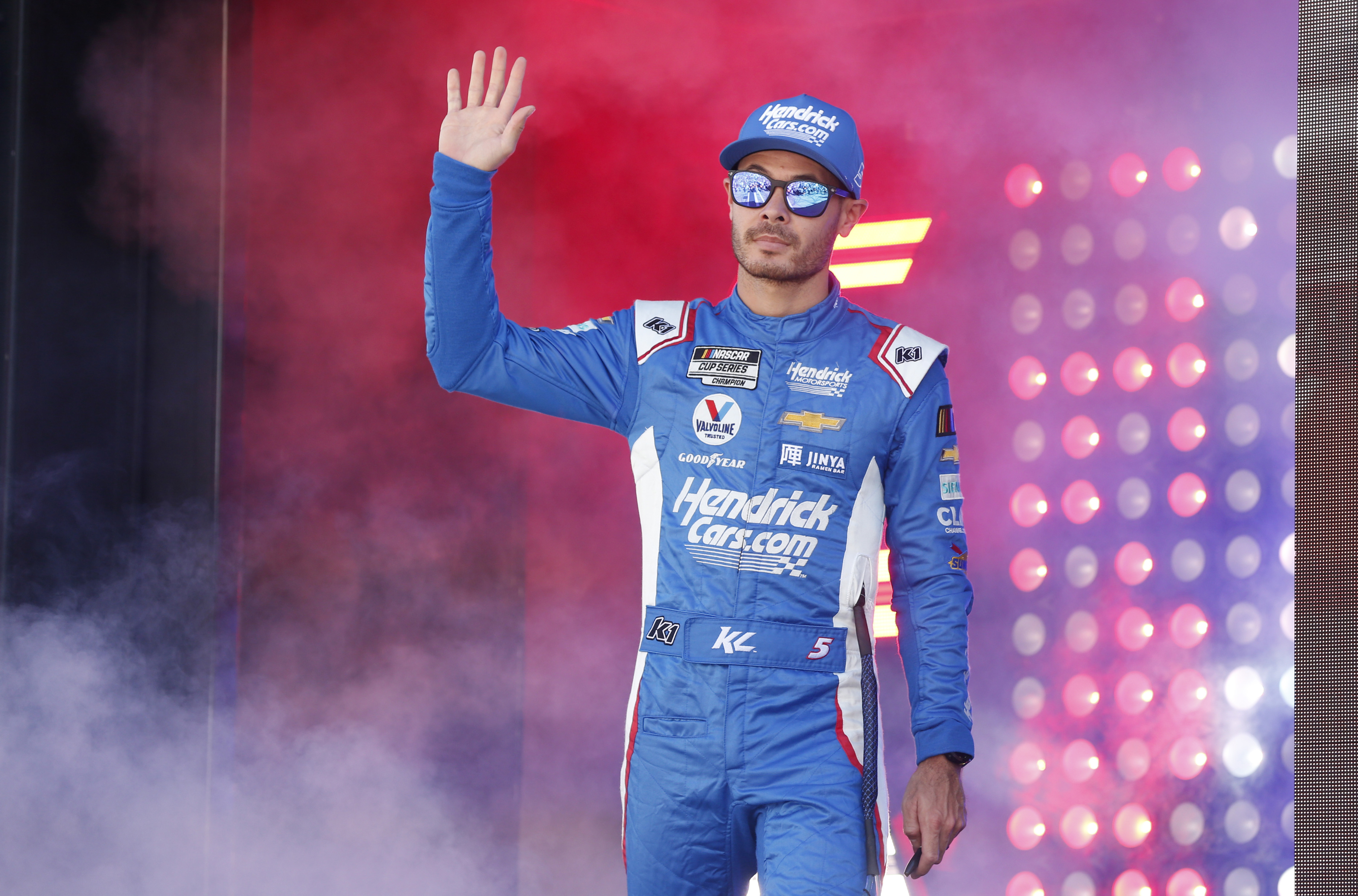 Kyle Larson waves during driver introductions before a NASCAR Cup Series auto race, Sunday, Oct. 15, 2023, in Las Vegas. 