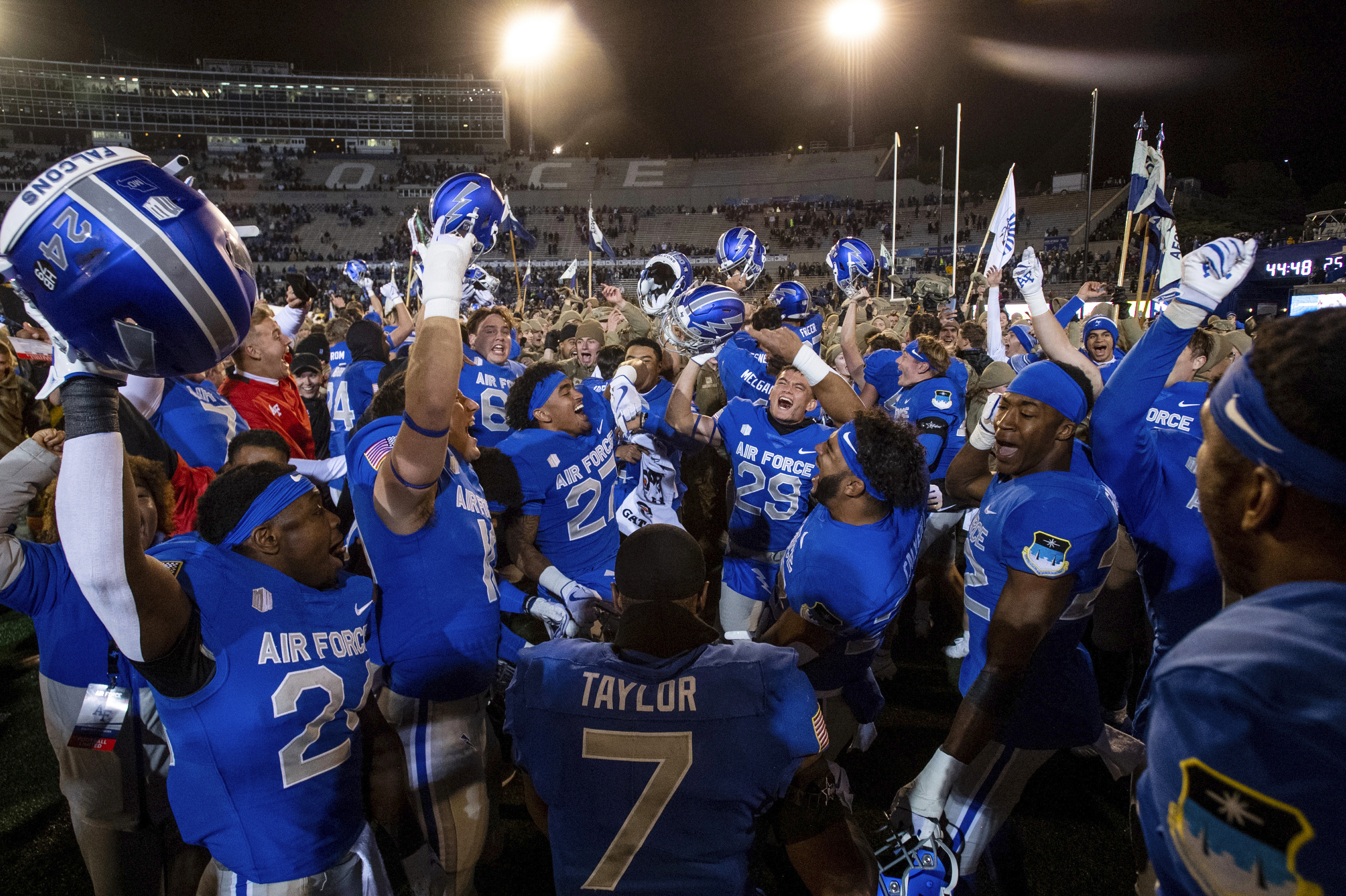 Air Force celebrates a win over Wyoming in an NCAA college football game Saturday, Oct. 14, 2023, at Air Force Academy, Colo.
