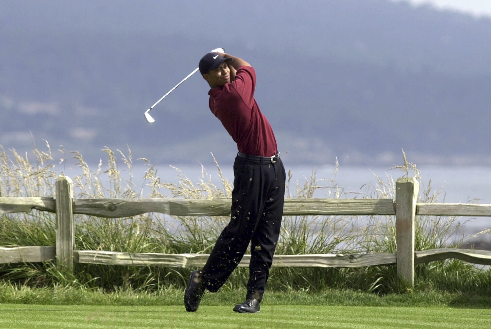 FILE - Tiger Woods drives the 18th hole on his way to winning the 100th U.S. Open Golf Championship at the Pebble Beach Golf Links in Pebble Beach, Calif., on June 18, 2000. A 60-foot birdie putt sunk on the 18th at St. Andrew’s before a playoff loss to John Daly at the 1995 British Open. A front-row seat to history paired with Tiger Woods in the final round of the 1997 Masters. Then a career-defining singles win over Woods later in ’97 that helped Europe win the Ryder Cup. It’s been nearly three decades since Costantino Rocca put Italian golf on the map and it’s hard to imagine the Ryder Cup being held near Rome this week would have happened without him. 