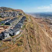 Housing market predictions: Fannie Mae revises 2023 home price forecast upward