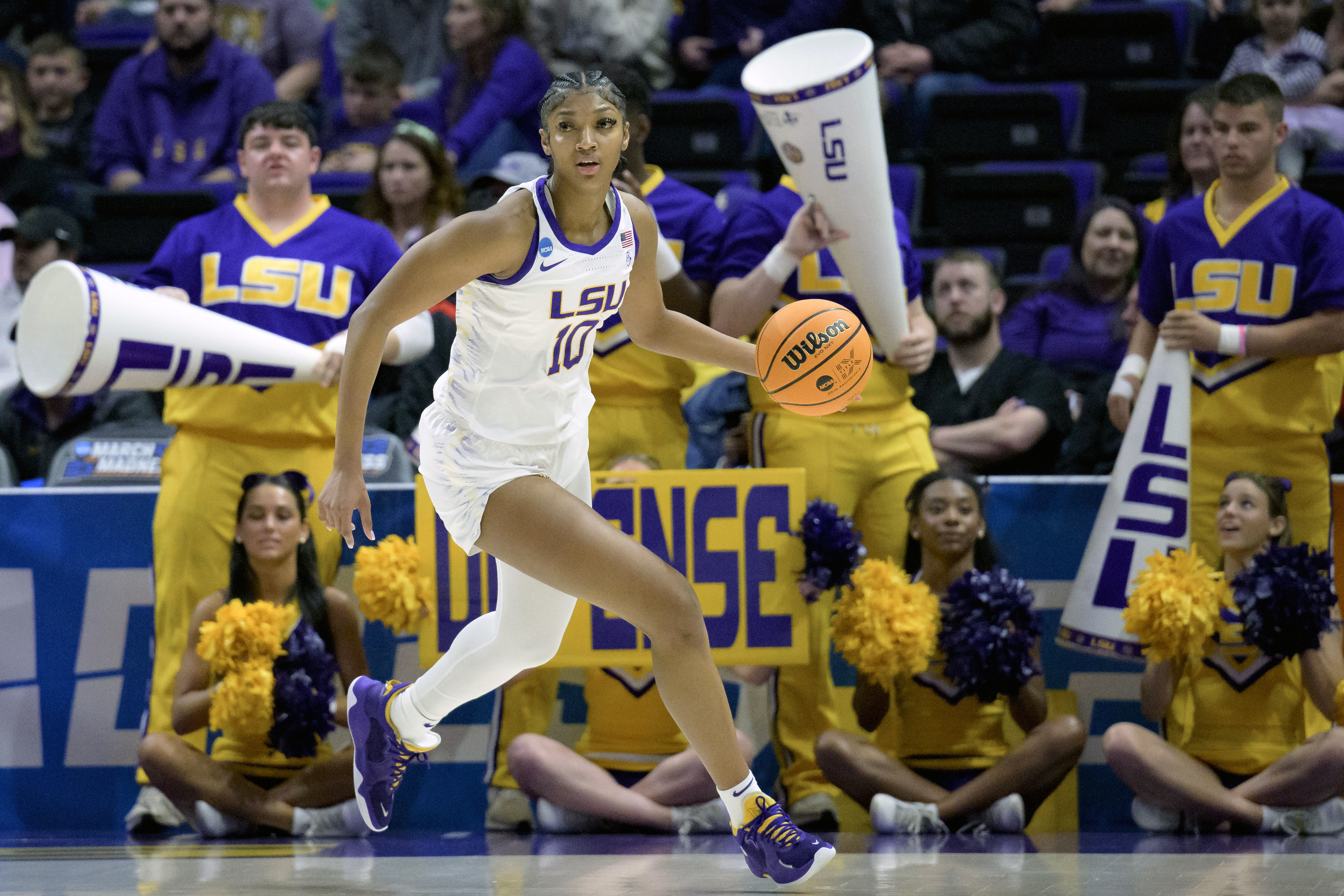 FILE - LSU forward Angel Reese (10) dribbles during a first-round college basketball game in the women's NCAA Tournament in Baton Rouge, La., Friday, March 17, 2023. Coming off the school's first NCAA women's basketball championship, LSU is ranked No. 1 in the AP Top 25 preseason women's basketball poll, released Tuesday, Oct. 17, 2023. There's clearly a lot of optimism around LSU as they return a stellar group, including Angel Reese and added two huge transfers with Hailey Van Lith and Aneesah Morrow.