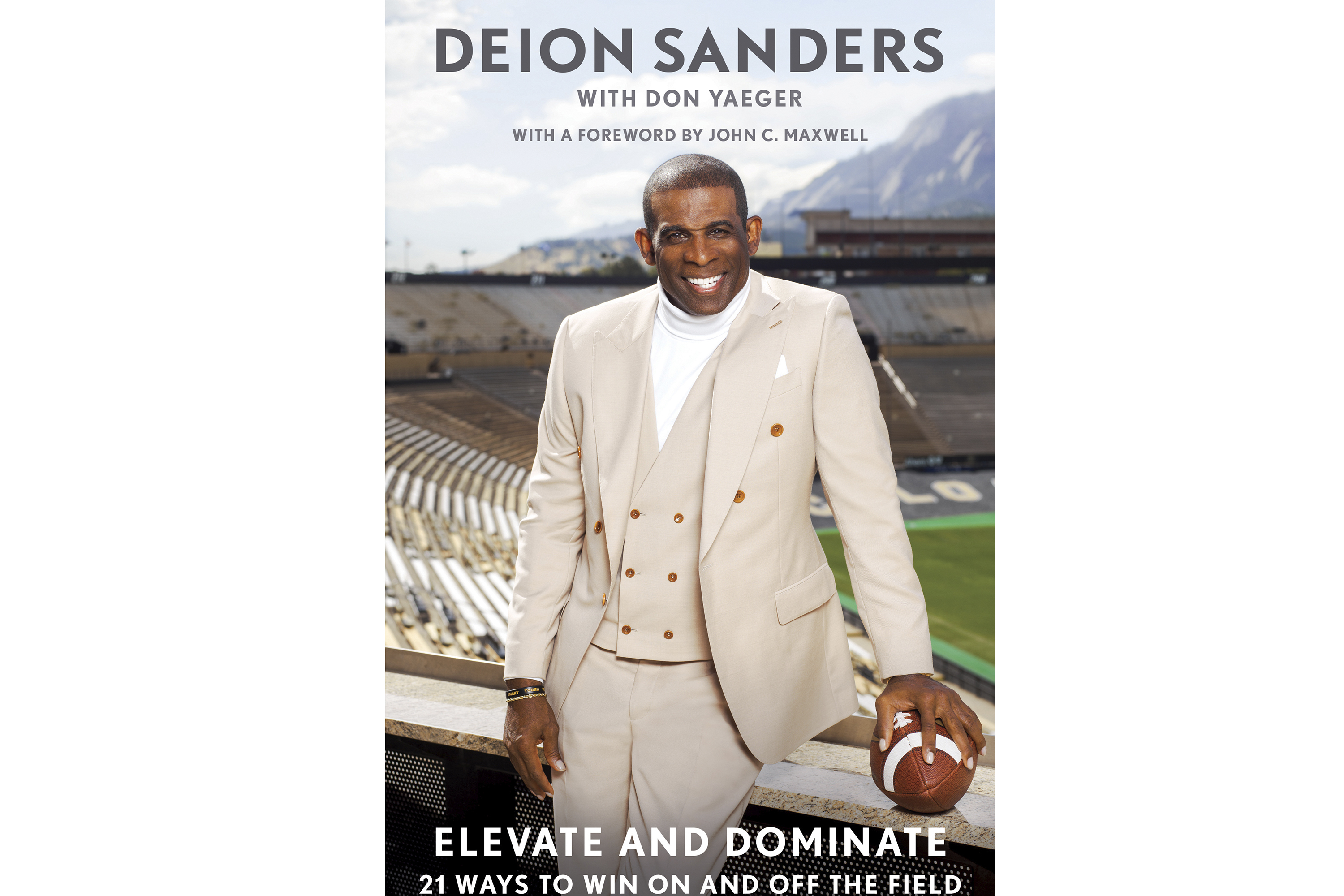 This cover image released by 13a, an imprint of Gallery Books, shows "Elevate and Dominate: 21 Ways to Win On and Off the Field" by Deion Sanders. The book will publish on March 12. 