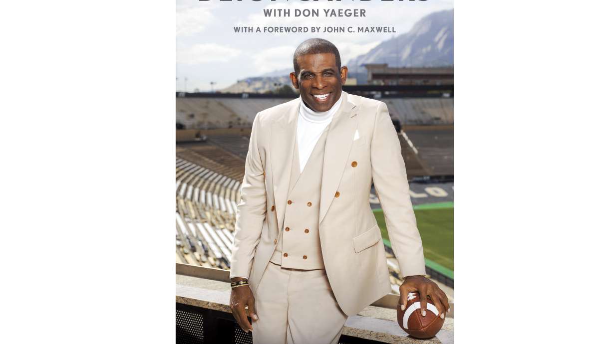 This cover image released by 13a, an imprint of Gallery Books, shows "Elevate and Dominate: 21 Ways to Win On and Off the Field" by Deion Sanders. The book will publish on March 12.