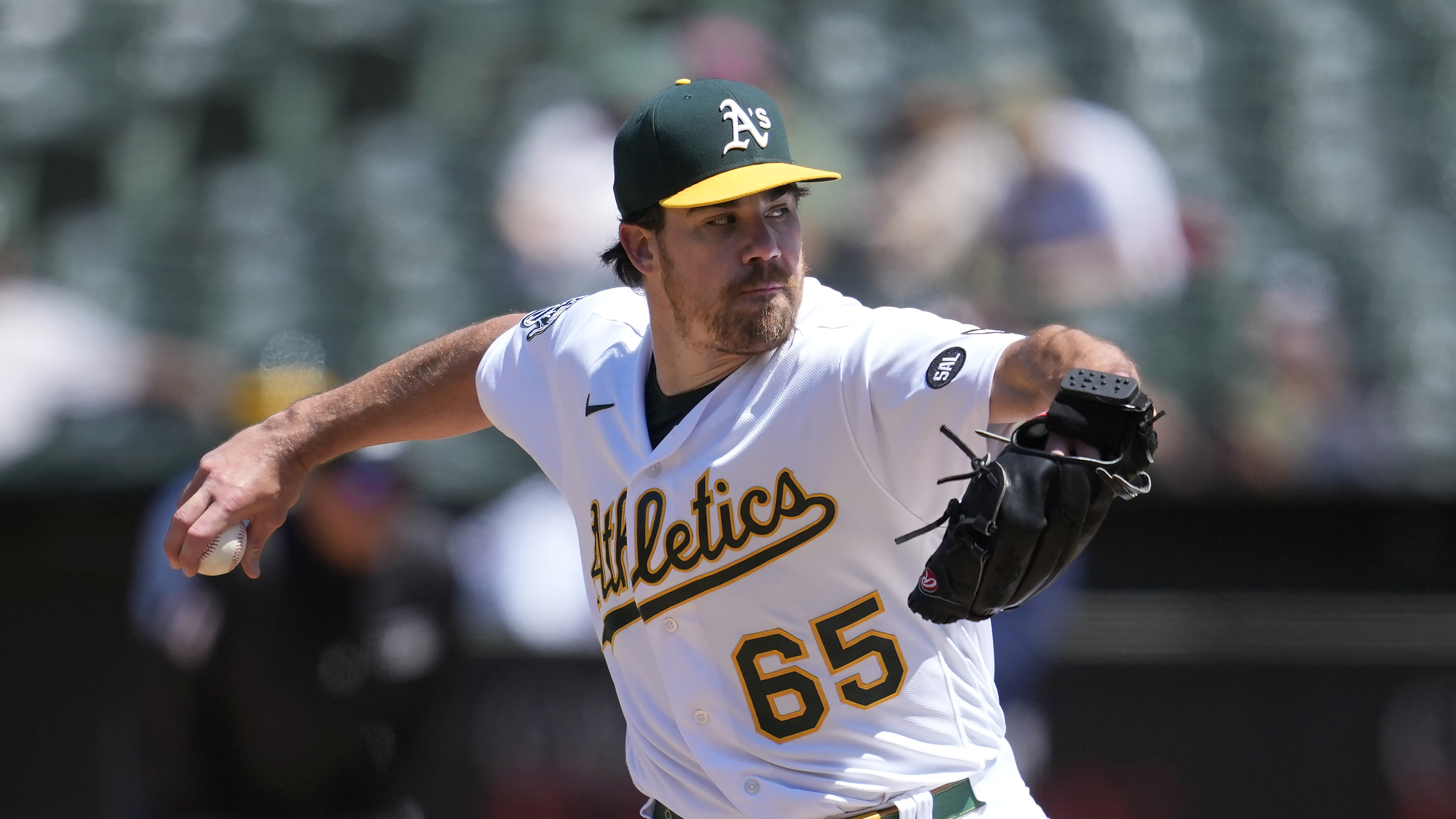 FILE - Oakland Athletics' Trevor May throws during a baseball game against the Houston Astros in Oakland, Calif., Saturday, May 27, 2023. Oakland A's reliefe pitcher Trevor May has announced his retirement from baseball, and in the process, implored owner John Fisher to sell the team.