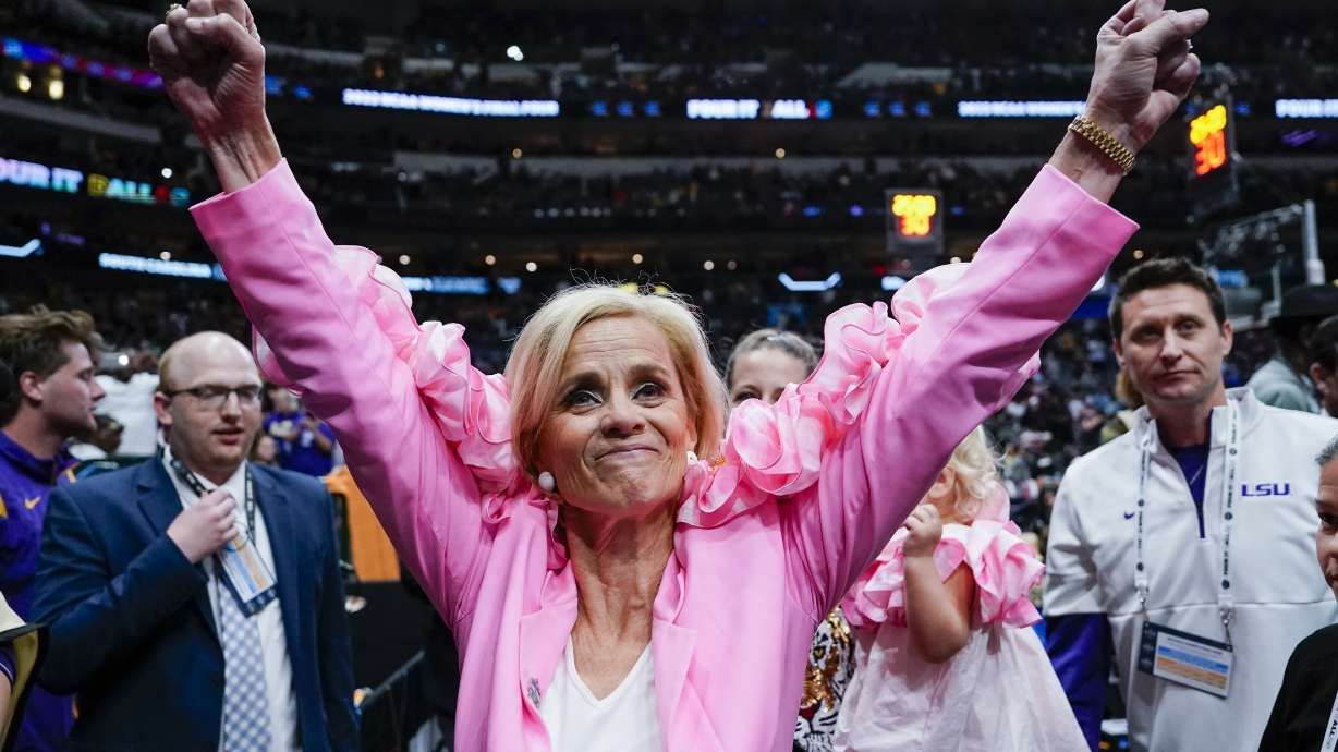 FILE - LSU head coach Kim Mulkey celebrates after an NCAA college Women's Final Four semifinal basketball game against Virginia Tech, Friday, March 31, 2023, in Dallas. Coming off the school's first NCAA women's basketball championship, LSU is ranked No. 1 in the AP Top 25 preseason women's basketball poll, released Tuesday, Oct. 17, 2023.