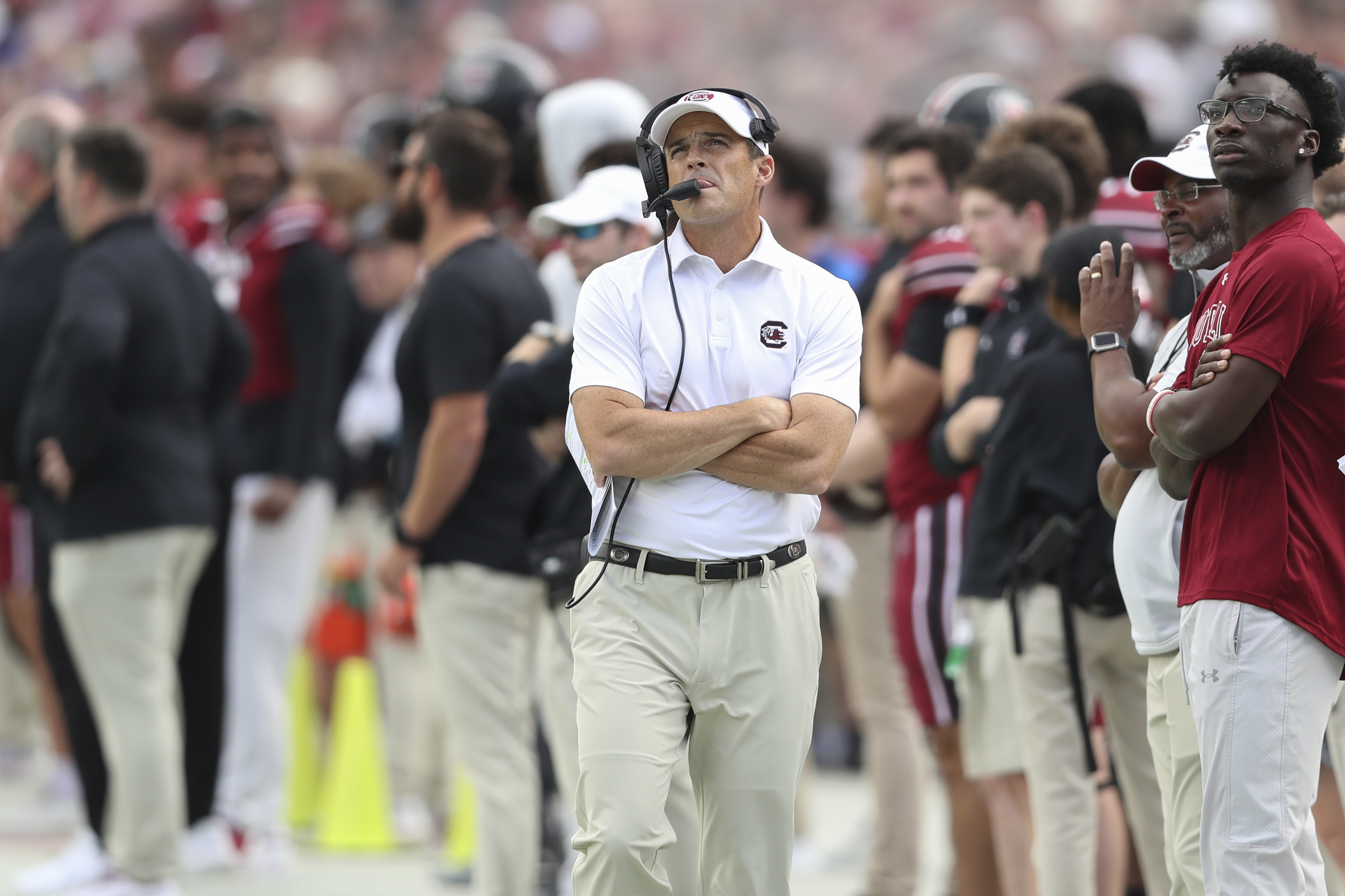 South Carolina head coach Shane Beamer checks the scoreboard during the first half of an NCAA college football game against Florida on Saturday, Oct. 14, 2023, in Columbia, S.C.