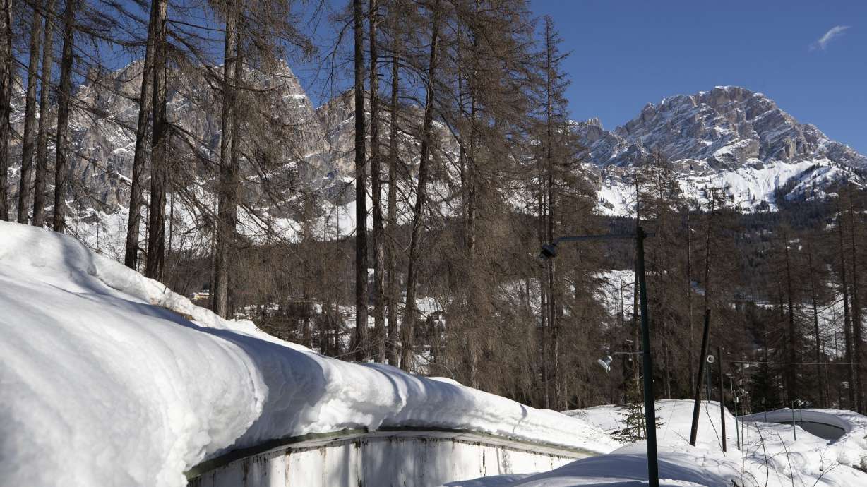 A view of the bobsled track in Cortina d’Ampezzo, Italy, Feb. 17, 2021. A big-ticket project for the 2026 Milan-Cortina Olympics has been dropped because the Italian government no longer wants to help fund it, organizing committee officials said on Monday.