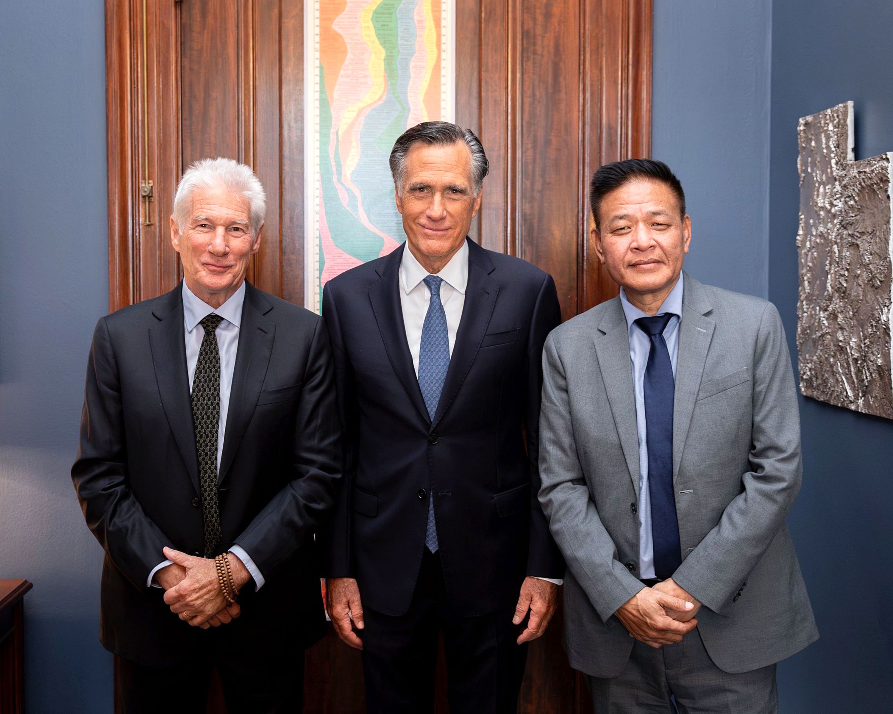 Utah Sen. Mitt Romney meets with actor and activist Richard Gere, left, and Penpa Tsering, right, Tuesday in Washington, D.C. Tsering’s title is Sikyong, which means he leads the Tibetan people in exile as head of the Central Tibetan Administration.