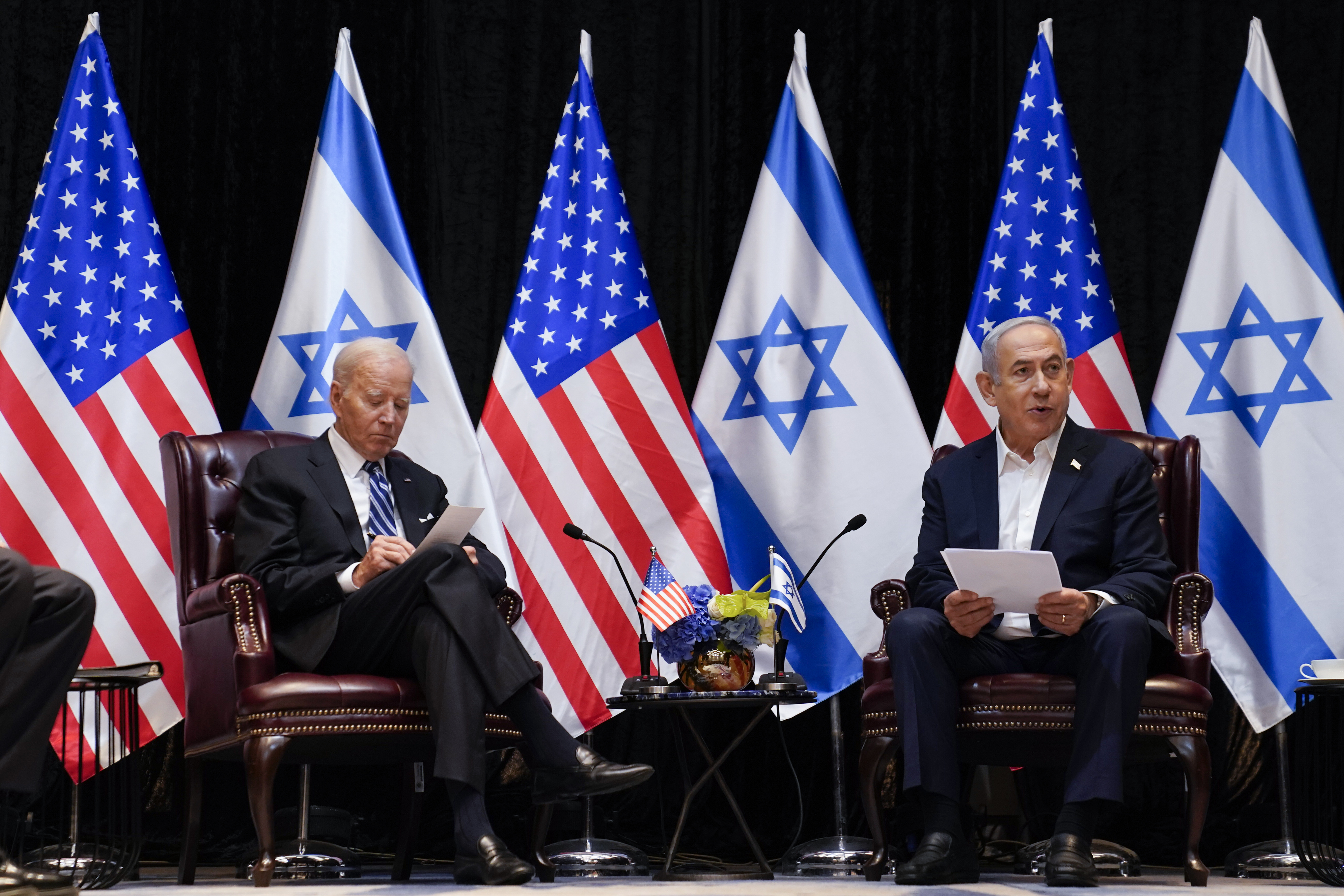 President Joe Biden and Israeli Prime Minister Benjamin Netanyahu participate in an expanded bilateral meeting with Israeli and U.S. government officials, Wednesday in Tel Aviv.