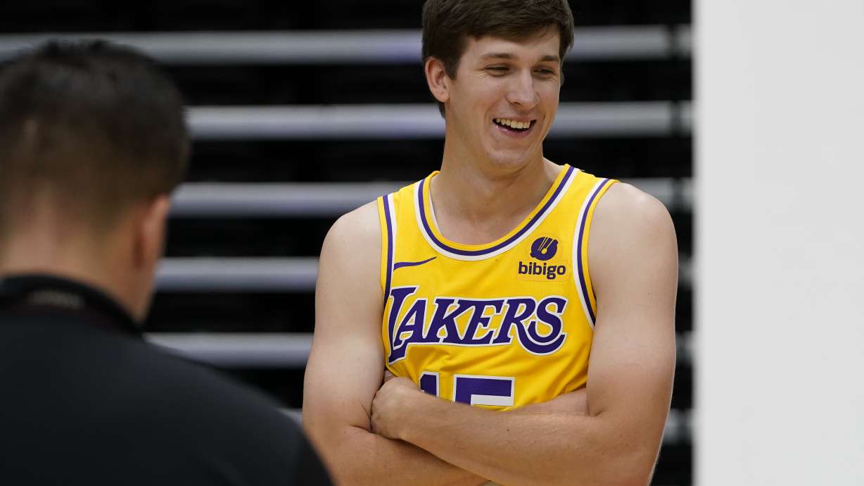 Los Angeles Lakers guard Austin Reaves poses for photos during the NBA basketball team's media day, Monday, Oct. 2, 2023, in El Segundo, Calif.