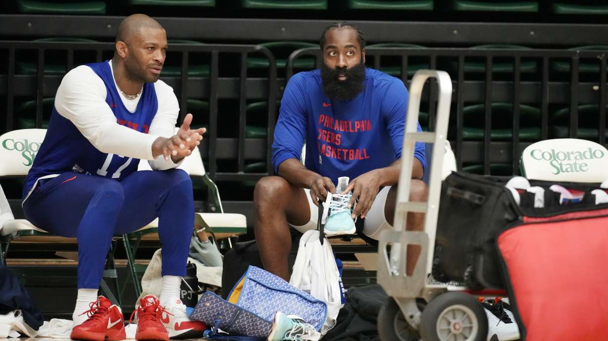 Philadelphia 76ers forward P.J. Tucker, left, chats with guard James Harden during the NBA basketball team's practice on Thursday, Oct. 5, 2023, in Fort Collins, Colo.