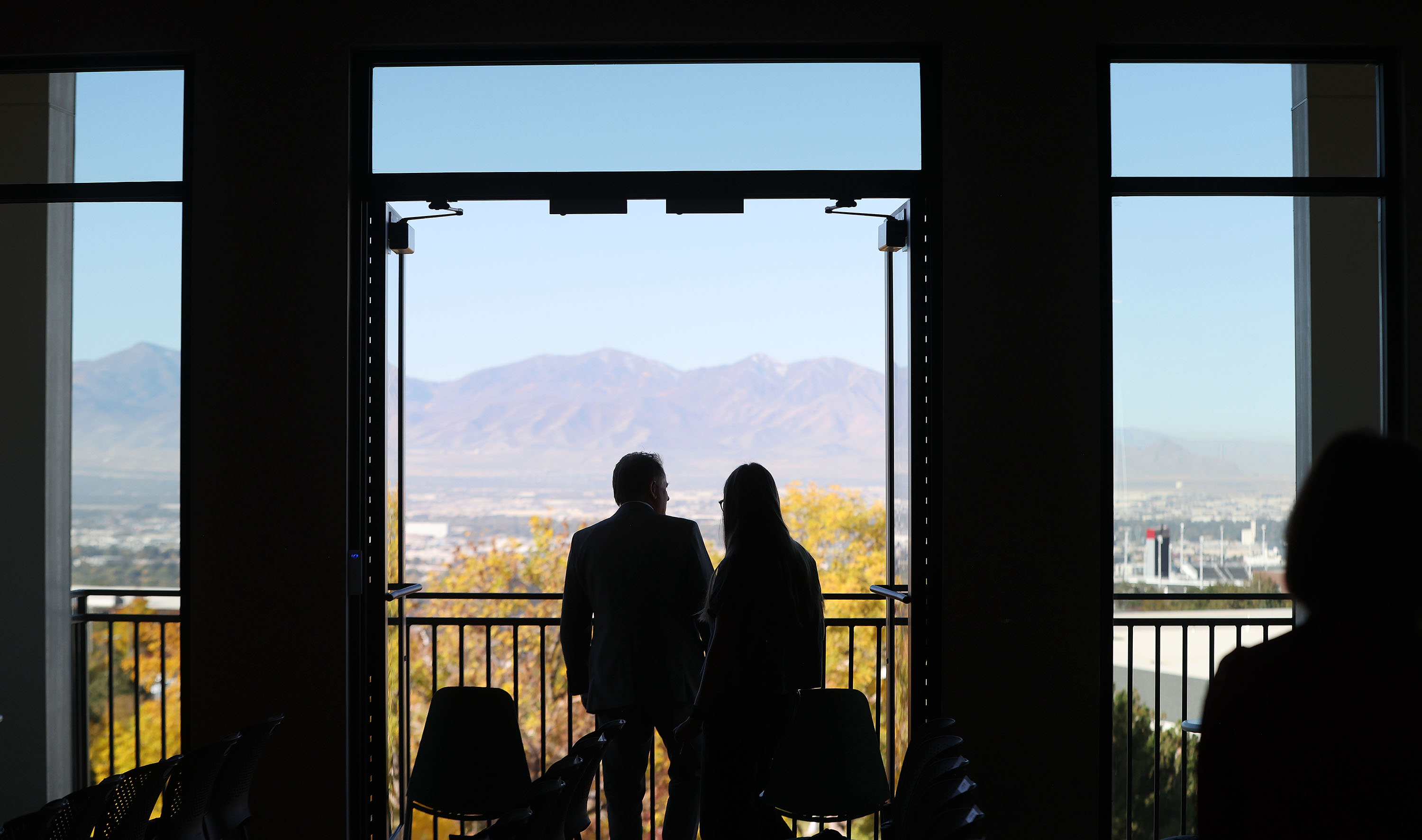 Visitors admire the view as the University of Utah, Ivory Family and The Church of Jesus Christ of Latter-day Saints celebrate the completion of the first of four student housing buildings in Salt Lake City on Wednesday.