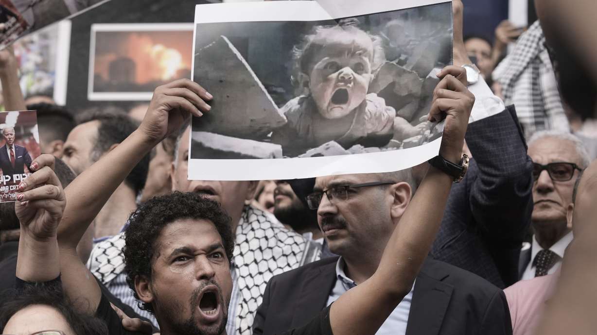 Egyptian protesters shout anti-Israeli slogans during a demonstration to show solidarity with Palestinians, in front of the Journalists Syndicate in Cairo, Egypt, on Wednesday.