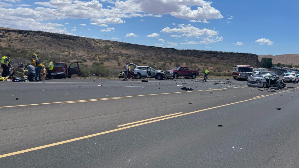 Responders tend to a three-vehicle crash on state Route 9, Hurricane, July 1, 2022. A Washington woman has been sentenced to prison for charges related to a crash on state Route 9 in Hurricane that killed a man last summer.