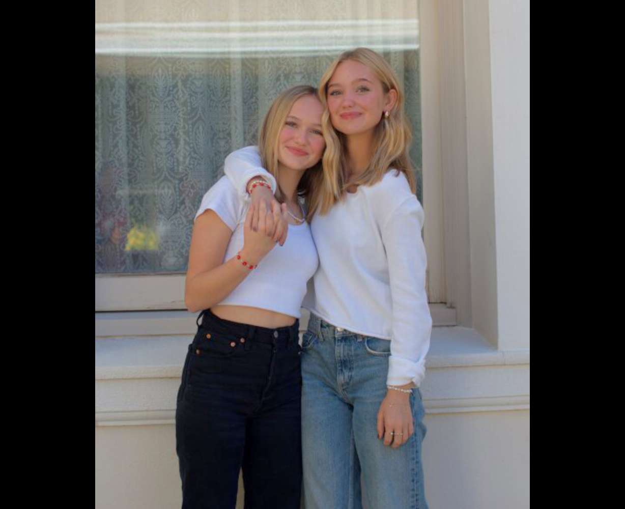 Leah Macfarlane, left is a perfect bone marrow donor match for her older sister Kate Macfarlane, right. The transplant is scheduled for the week before Halloween.