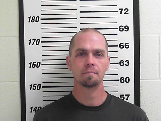 Adam Burdick was arrested for investigation of forgery after the Davis County Sheriff's Office says it learned he served two months in jail pretending to be his brother.