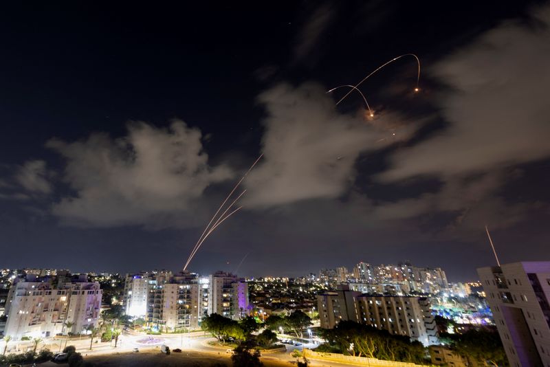 Israel's Iron Dome anti-missile system intercepts rockets launched from the Gaza Strip, as seen from Ashkelon, in southern Israel, Thursday.