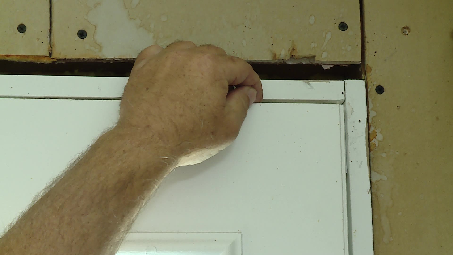 The warping on the door frame on Russell Thomson's house in Vernon, Tooele County. He says he paid thousands for the new doors but they were installed incorrectly.