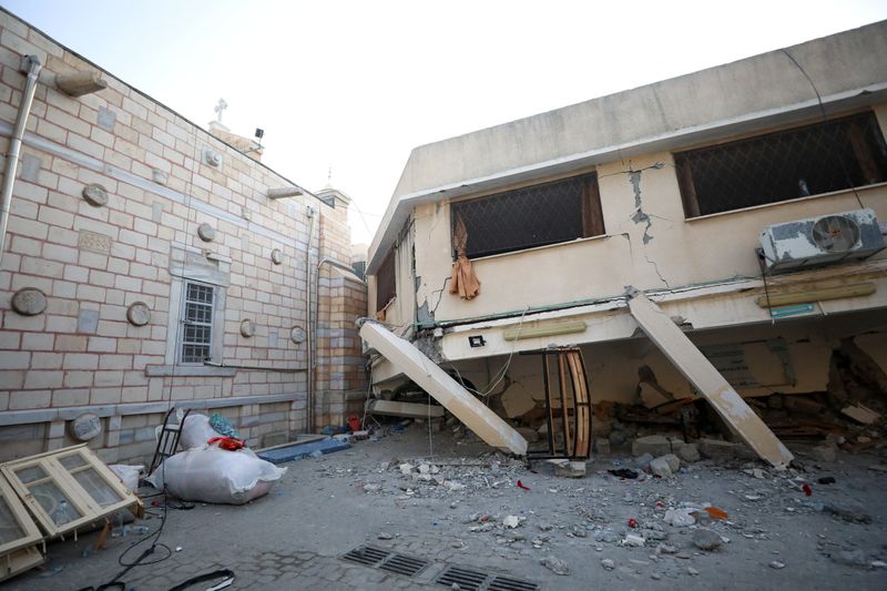 A general view at the Greek Orthodox Saint Porphyrius Church which was damaged by an Israeli strike, where Palestinians who fled their homes take shelter, in Gaza City, Friday.